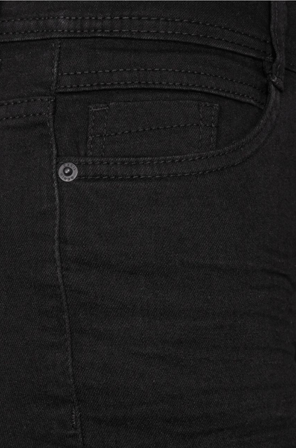 A close-up view of the back pocket of black jeans, showcasing the fabric texture and stitching details.